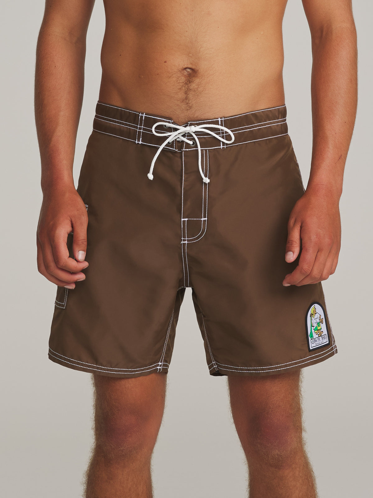Katin Waterman Trunk in Cocoa, on model, front #color_cocoa