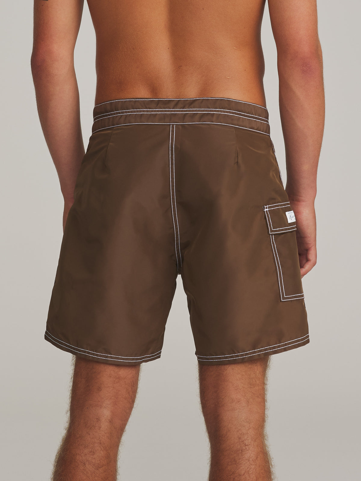 Katin Waterman Trunk in Cocoa, on model, back #color_cocoa