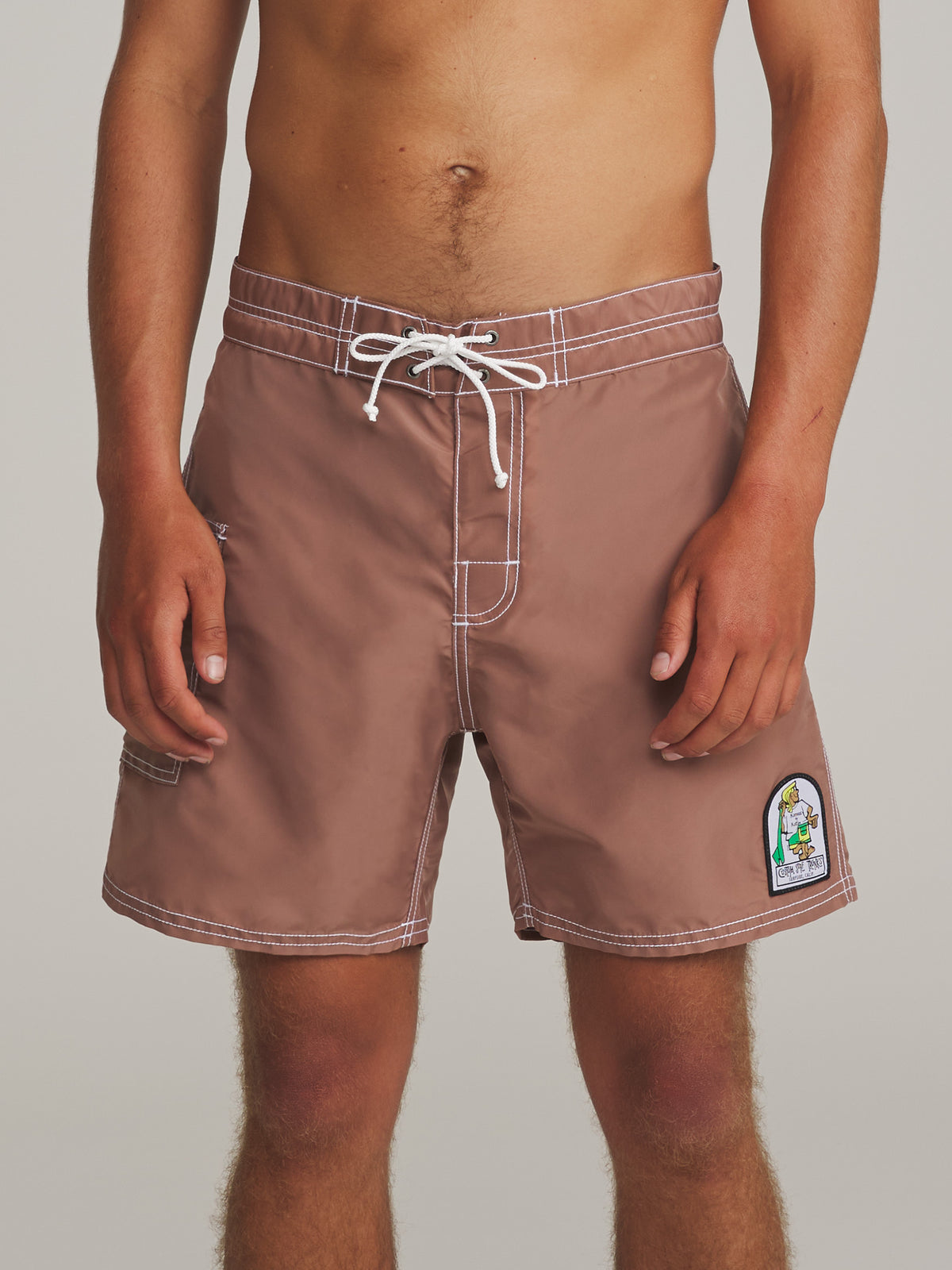 Katin Waterman Trunk in Dark Clay, on model, front #color_dark clay
