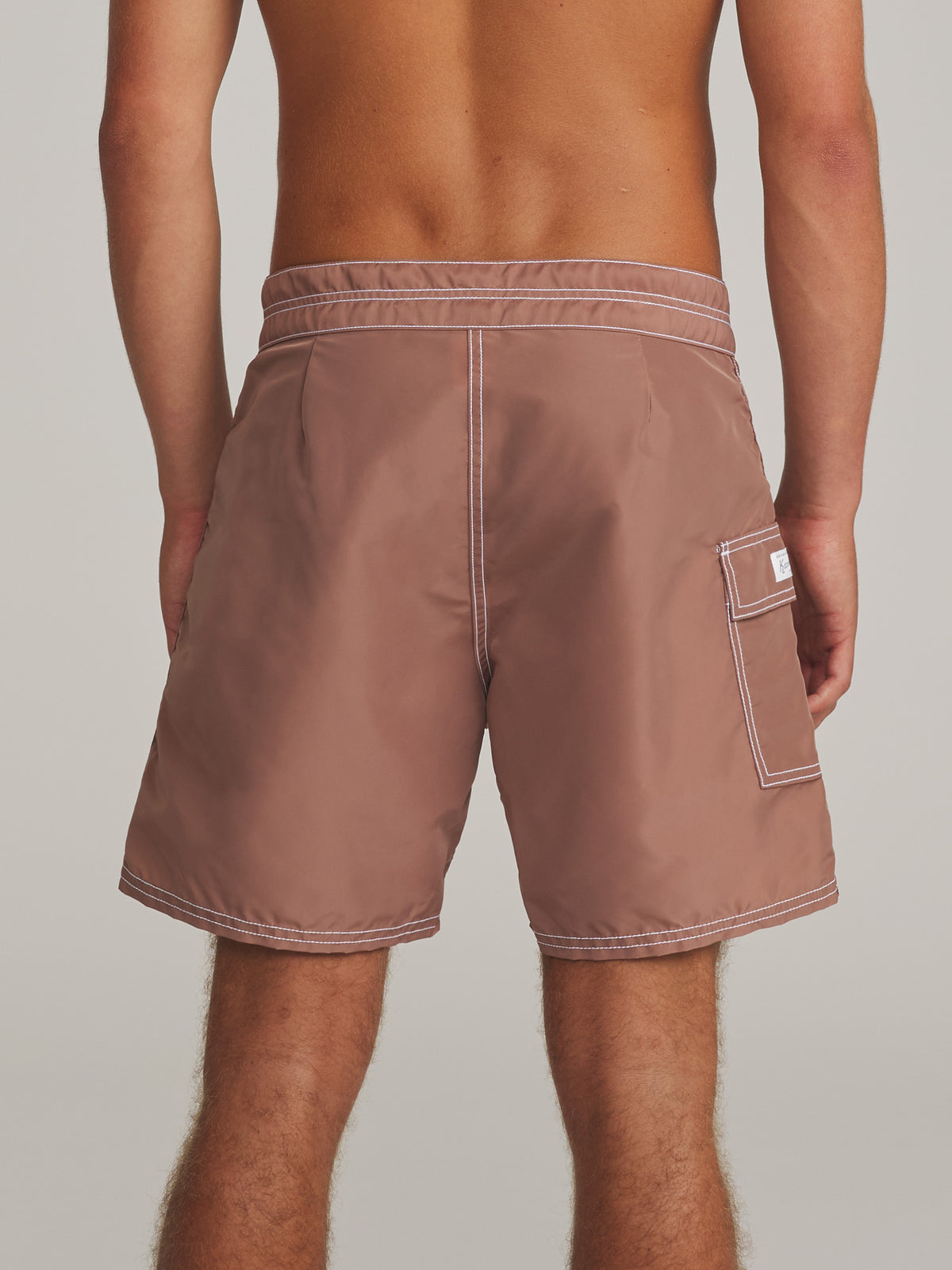 Katin Waterman Trunk in Dark Clay, on model, back #color_dark clay