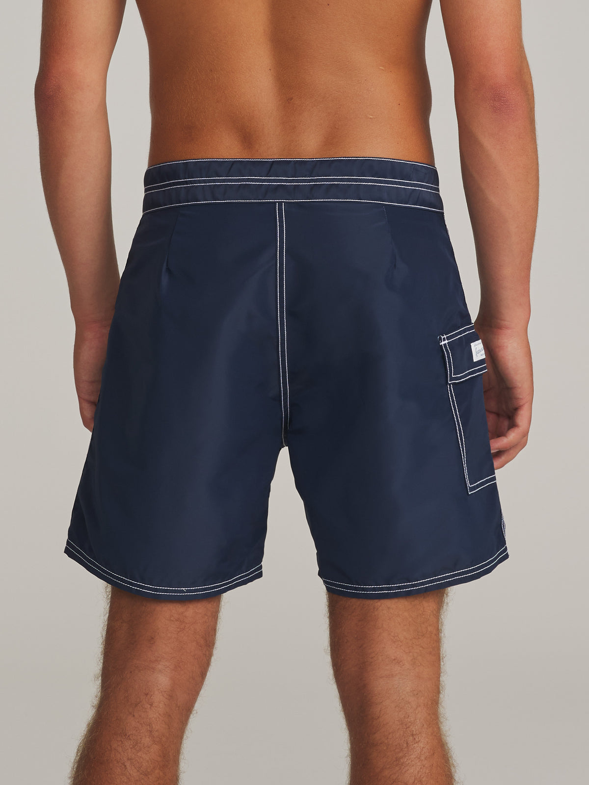 Katin Waterman Trunk in Navy, on model, back #color_navy