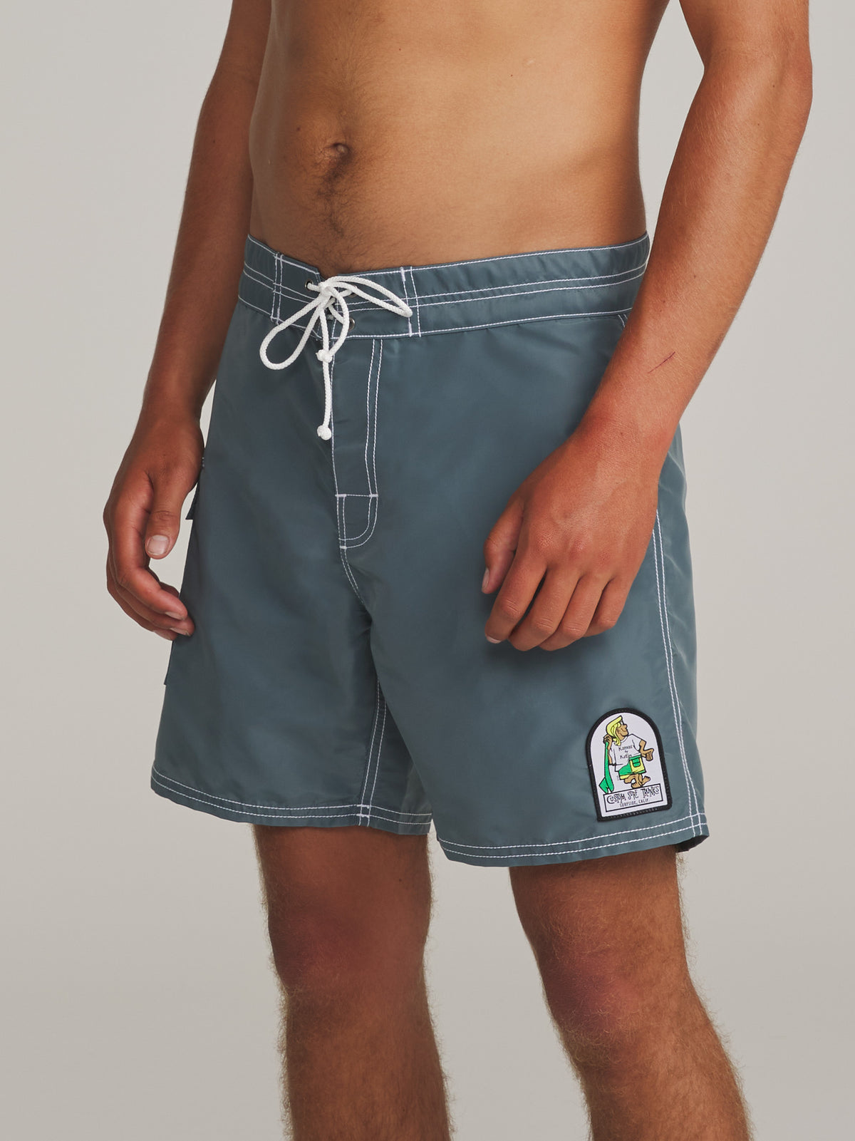 Katin Waterman Trunk in Tempest Blue, on model, side #color_tempest blue