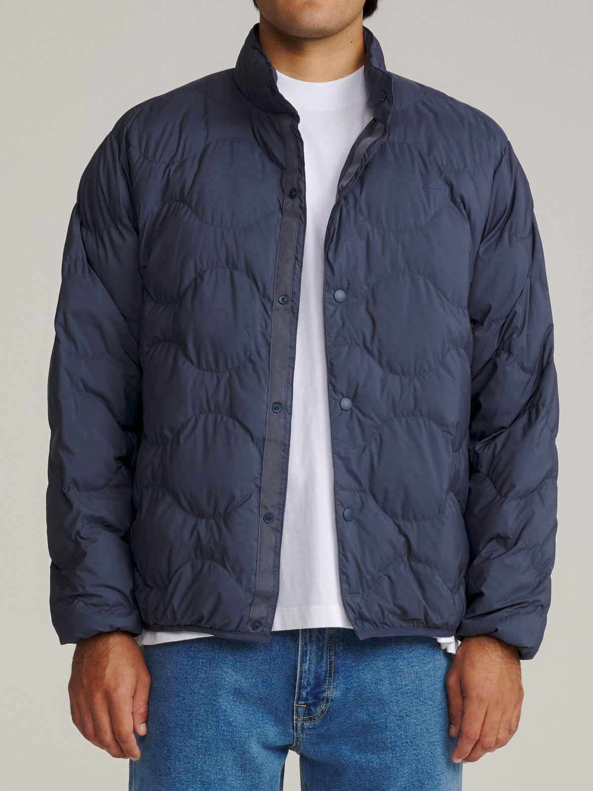 Katin OTG Ross Puffer in Washed Blue with an onion quilt pattern, on model, front #color_washed blue