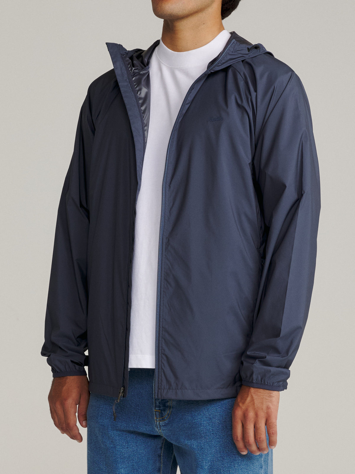 Katin OTG Shadow Jacket in Washed Blue Katin logo at left chest, on model, side #color_washed blue