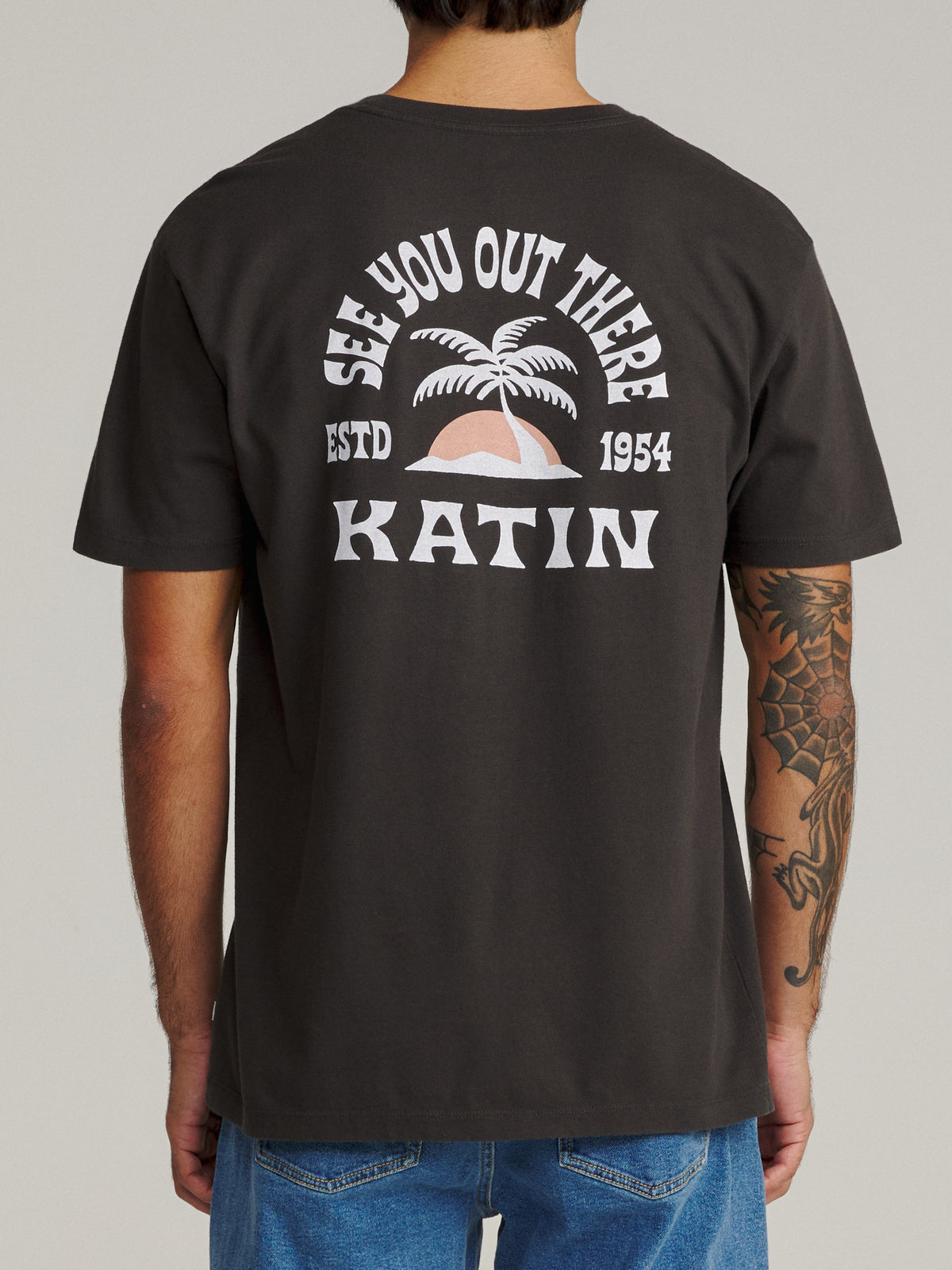 Katin Nosara Tee in Black Wash midweight jersey, on model, back #color_black wash