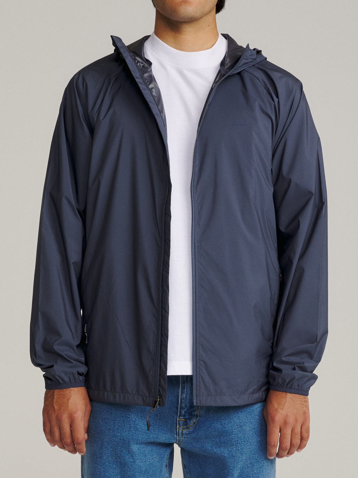 Katin OTG Shadow Jacket in Washed Blue Katin logo at left chest, on model, front #color_washed blue