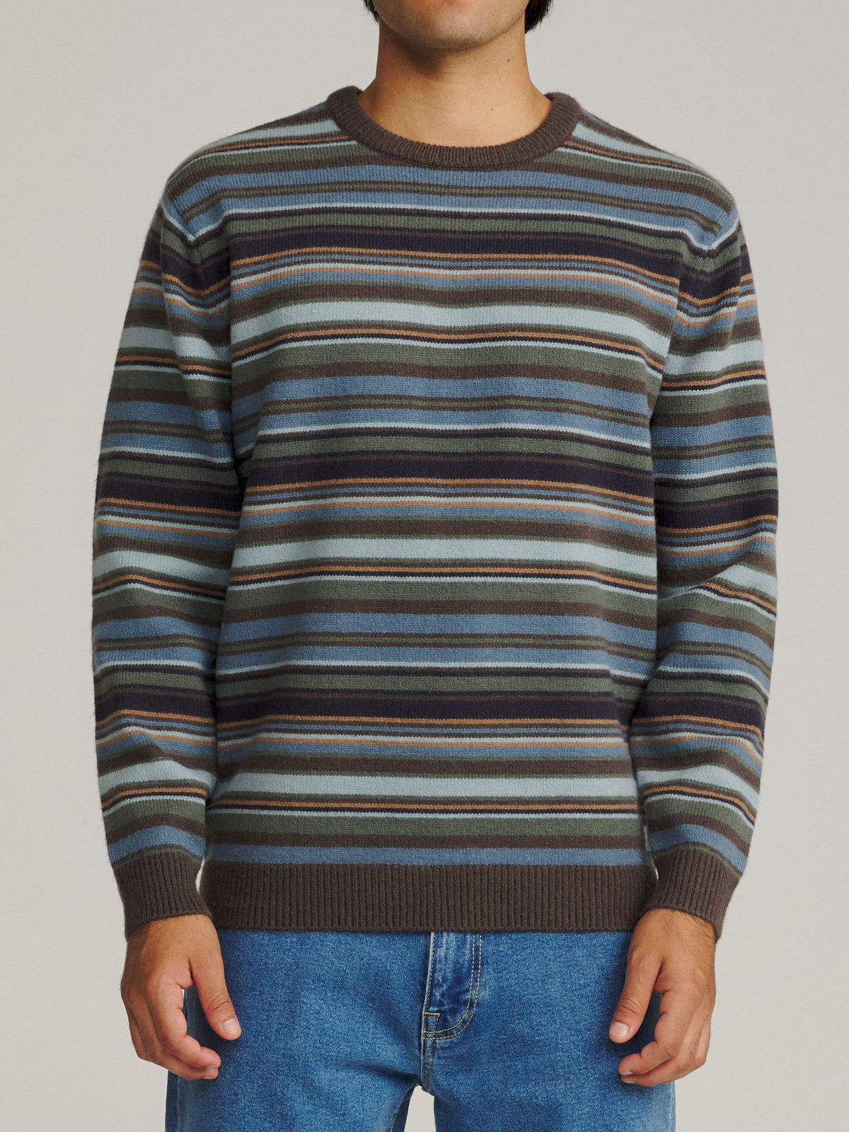 Katin Hitch Sweater in Tempest Blue with a stripe pattern, on model, front #color_tempest blue